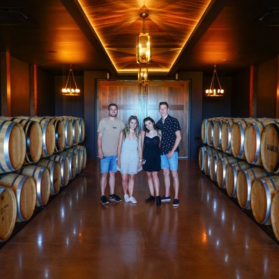 3 people inside the winery